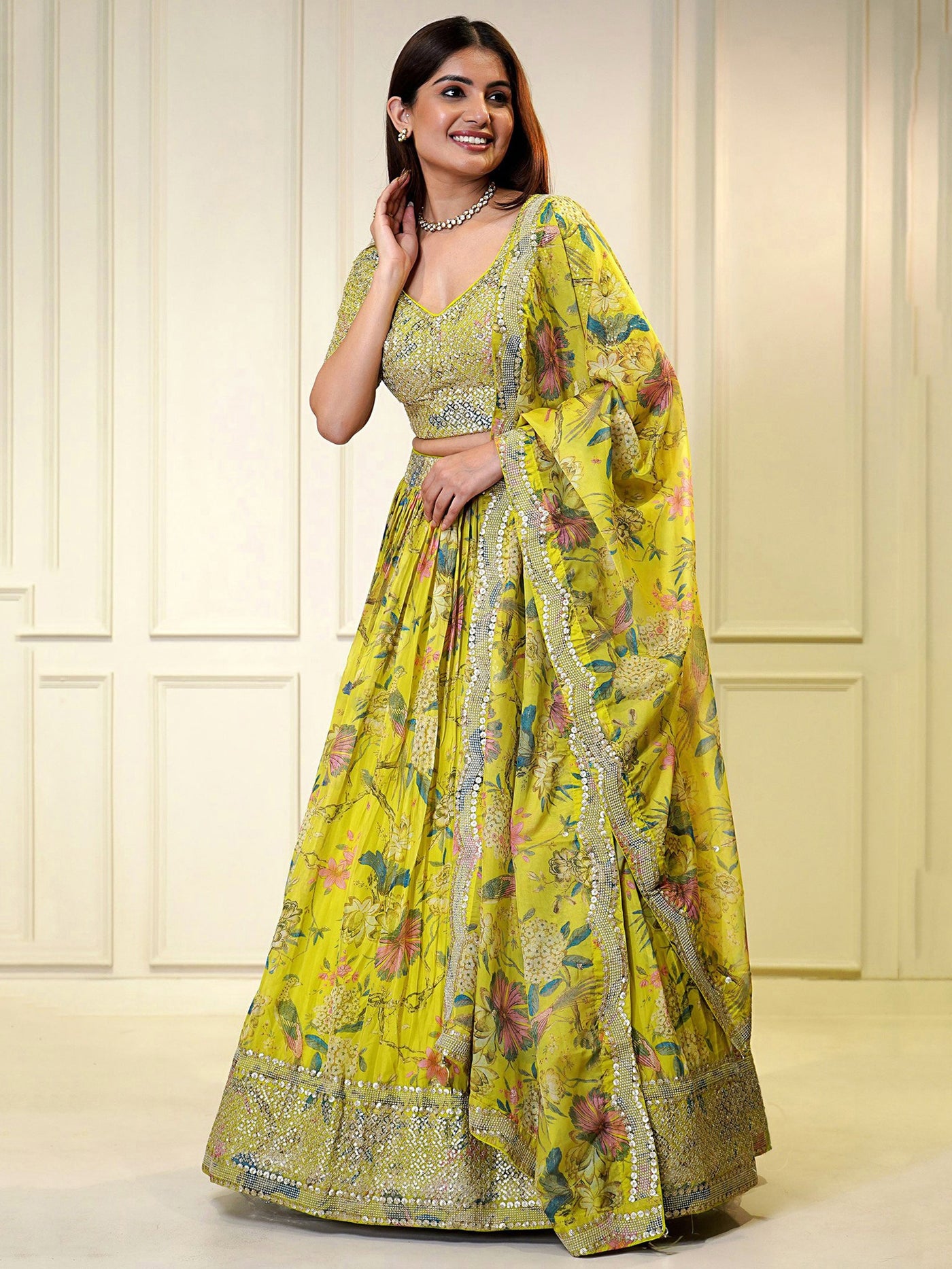 Attractive Yellow Sequins Organza Haldi Wear Lehenga Choli