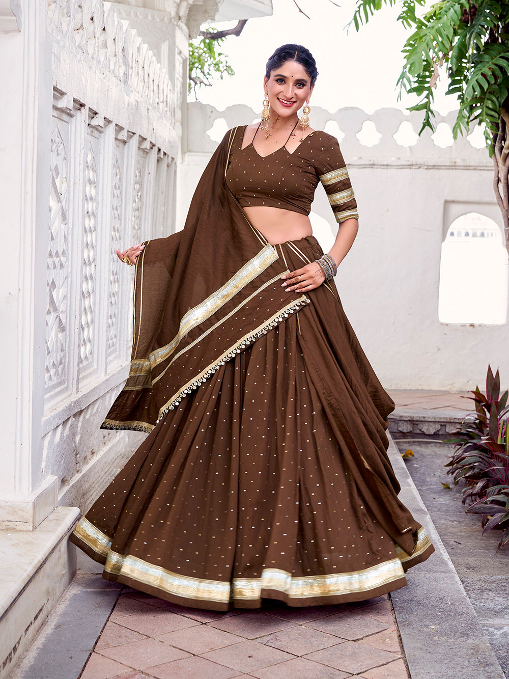 Brown Color Zari Weaving Work With Embossed Design Chanderi Lehenga Choli