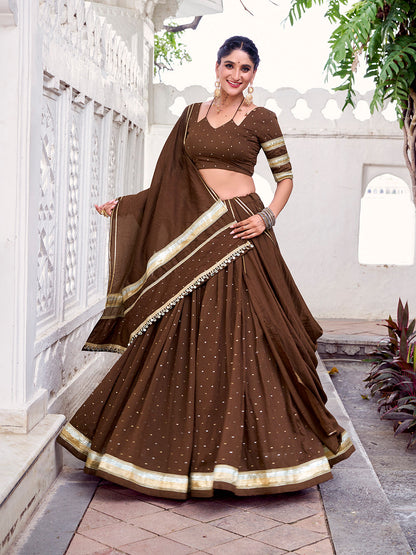 Brown Color Zari Weaving Work With Embossed Design Chanderi Lehenga Choli